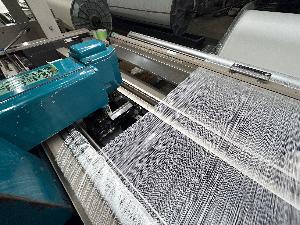 タオル用伸べ仕上げ作業のイメージ画像