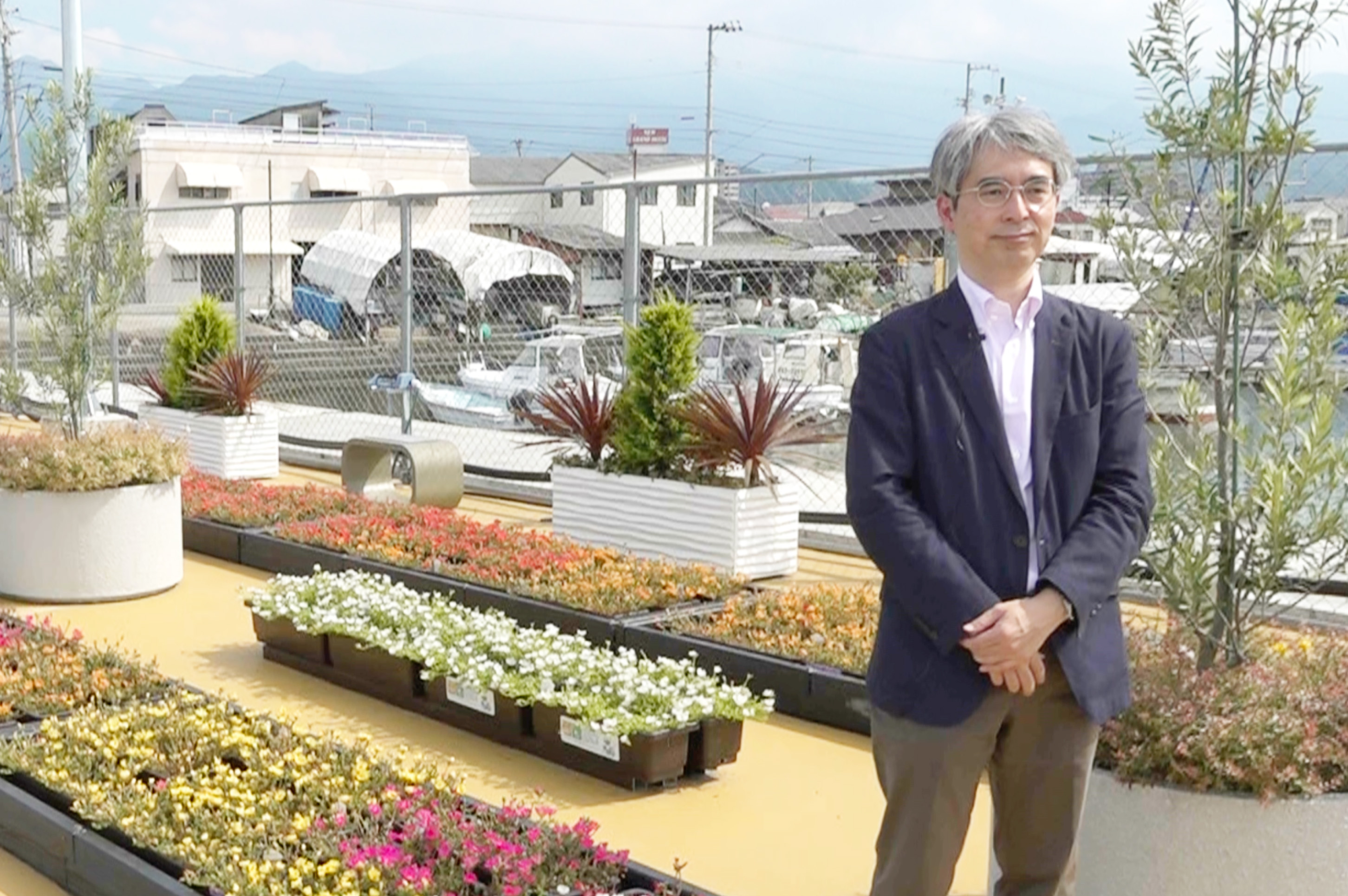 住友化学の創業から続く理念や目標について話す浜野さん。